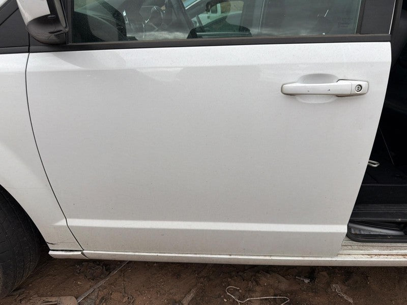 Used Front Left Door Assembly Front fits: 2019 Dodge Caravan electric 