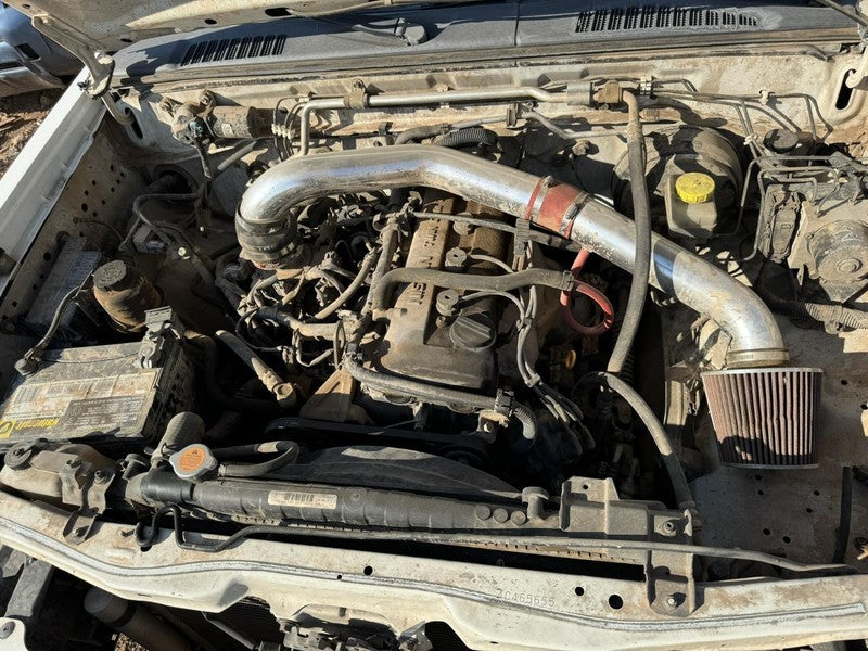 Used Manual Transmission Assembly fits: 2004 Nissan Frontier MT 4 cyli