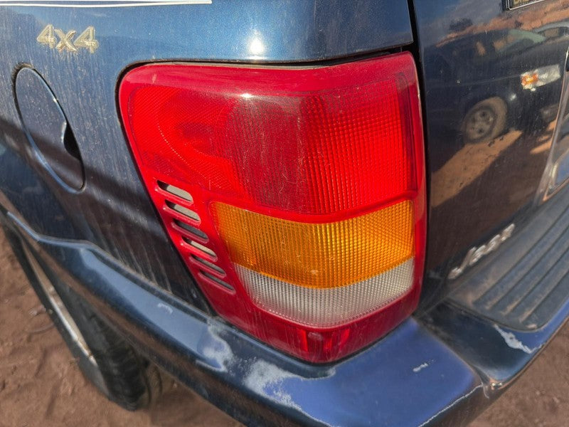 Used Left Tail Light Assembly fits: 2000 Jeep Grand cherokee Left Grad
