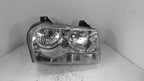 Used Right Headlight Assembly fits: 2006 Chrysler 300 halogen w/o proj
