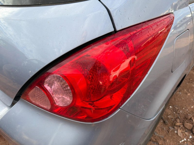 Used Right Tail Light Assembly fits: 2012 Nissan Versa quarter panel m