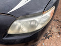 Used Left Headlight Assembly fits: 2010 Toyota Corolla L. w/o black tr